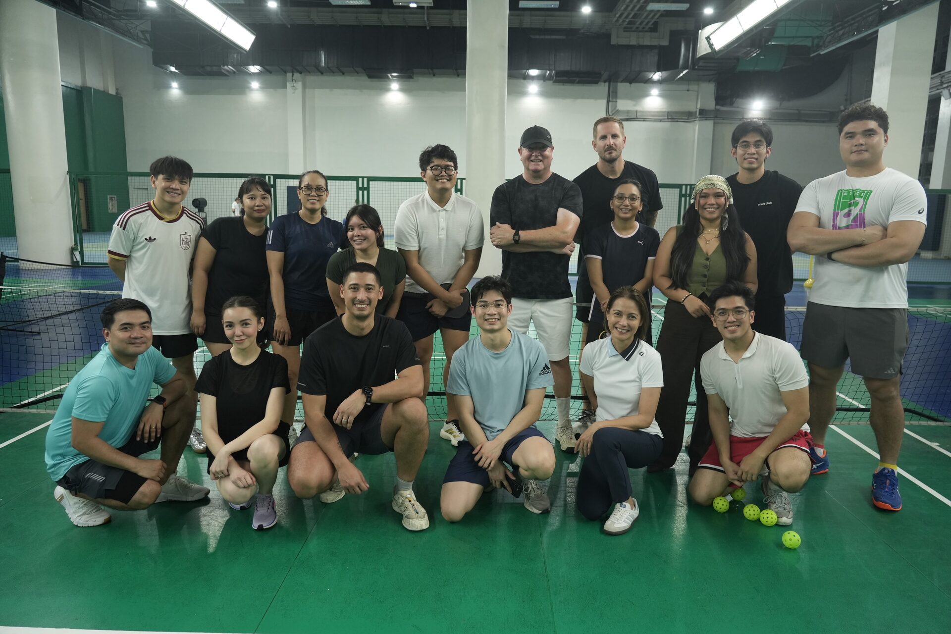 James Corden-Lloyd with a corporate group after teaching pickleball in Manila, September 2026