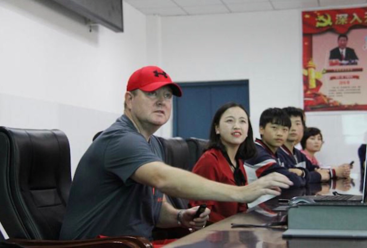 James Corden-Lloyd teaching tennis-related English to students and staff in Chengdu, China